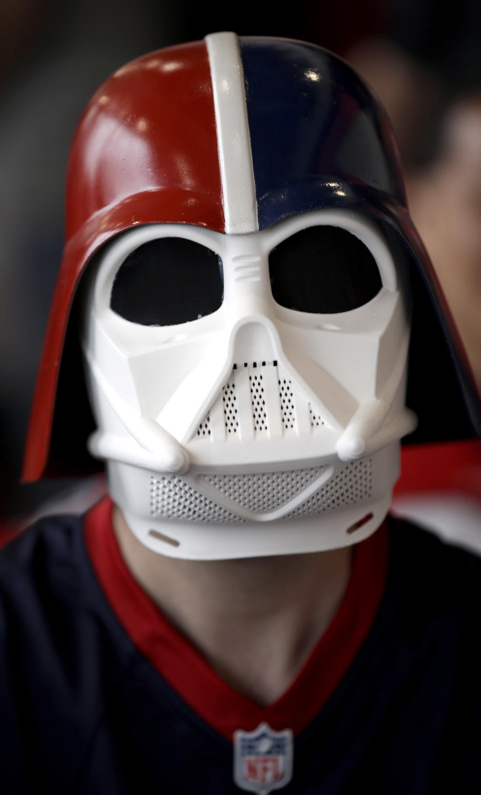 A Houston Texans fan who calls himself Darth Texan waits for the start of the NFL draft at a Houston Texans draft day party at NRG Stadium Thursday, May 8, 2014, in Houston. The Texans have the number one pick in the NFL draft. (AP Photo/David J. Phillip)