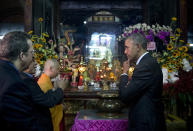 <p>U.S. President Barack Obama visits the Jade Emperor Pagoda with Thich Minh Thong, abbot of the Jade Emperor Pagoda, second from right, and Duong Ngoc Dung, Professor at Ho Chi Minh City University of Social Sciences and Humanities, third from right, in Ho Chi Minh City, Vietnam, Tuesday, May 24, 2016. The Jade Emperor Pagoda is one of the most notable and most visited cultural destinations in Ho Chi Minh City. (AP Photo/Carolyn Kaster) </p>