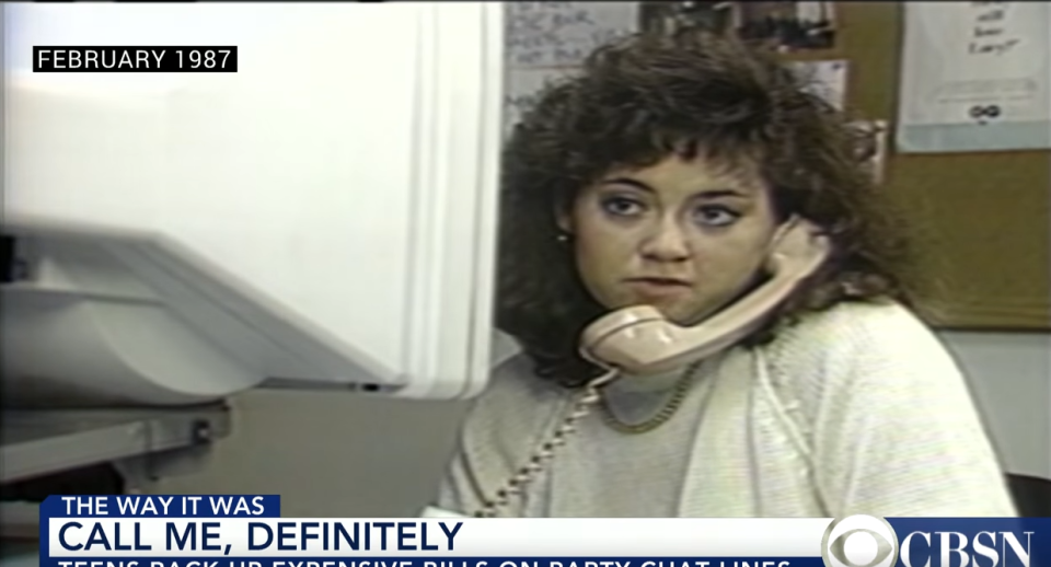 A woman with curly hair in the 1980s is using a corded phone. The CBSN news segment is titled "CALL ME, DEFINITELY" and is about teens incurring expensive bills on party chat lines