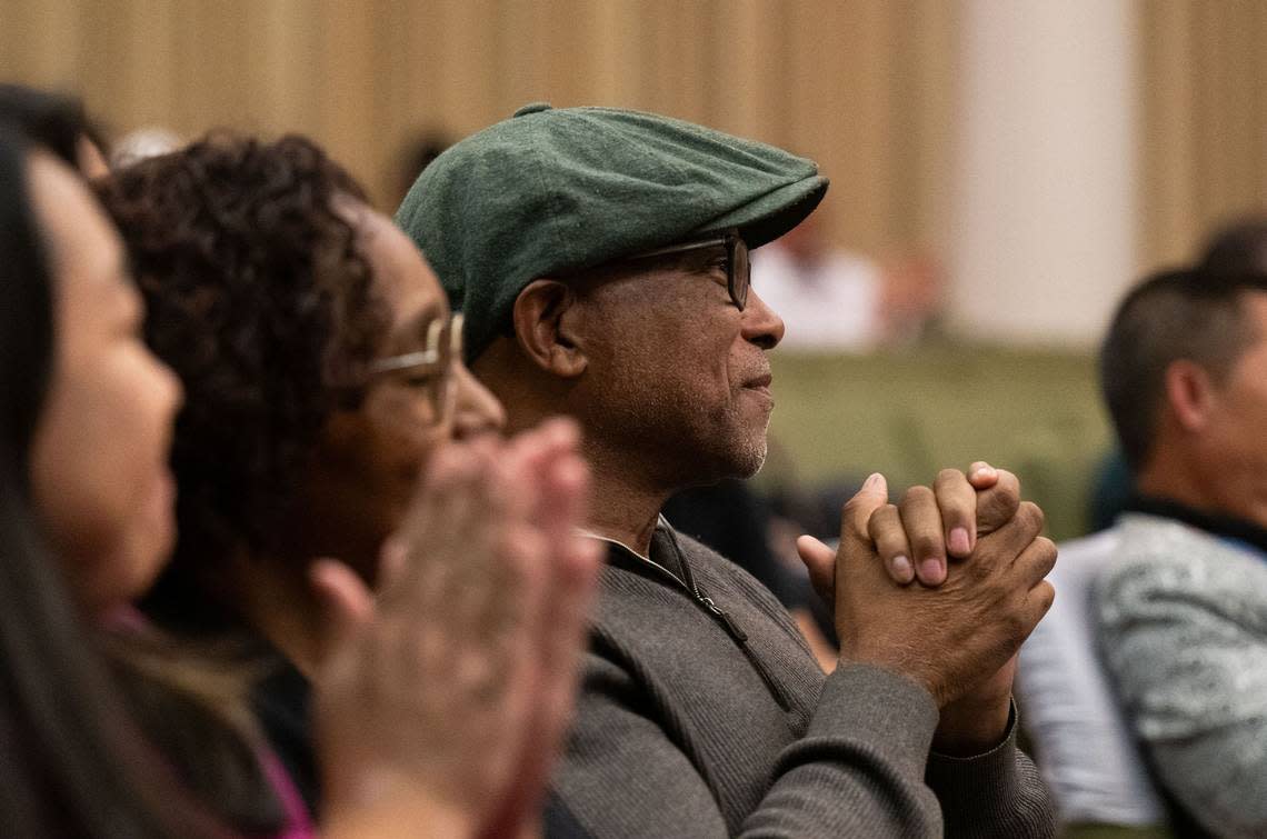 Former Sacramento City Councilman Allen Warren claps as interim District 2 Sacramento City Councilman Shoun Thao is welcomed to the council on Tuesday, April 2, 2024. Thao worked as a city staffer for Warren.