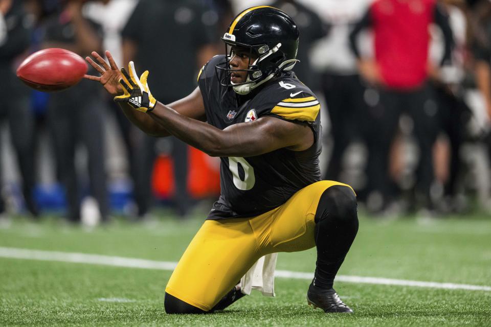 FILE - Pittsburgh Steelers punter Pressley Harvin III receives the snap for a PAT during the first half of an NFL preseason football game, Aug. 24, 2023, in Atlanta. Harvin III was released by the Steelers on Monday, Feb. 12, 2024, in a cost-cutting move designed to free up salary cap space going into free agency. (AP Photo/Danny Karnik, File)