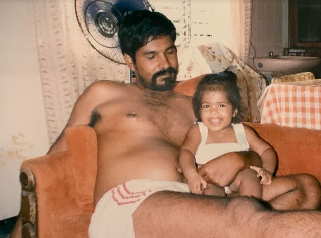 The author, age 10 months, with her father. (Photo: Courtesy of Nandini Maharaj)