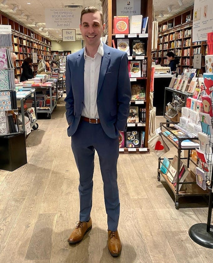 Dylan Lyons, founder and CEO of the Lavender Rhino, in a brick-and-mortar bookstore.