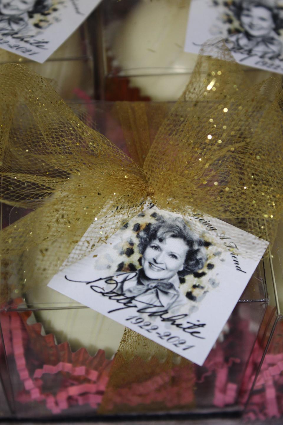 “Betty Bombs,” a ball shaped chocolate shell filled with flavored cocoa powder and marshmallows, are part of the Betty White Challenge.