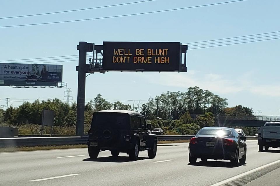 New Jersey Department of Transportation roadside safety sign which says: "We'll be blunt, don't drive high."