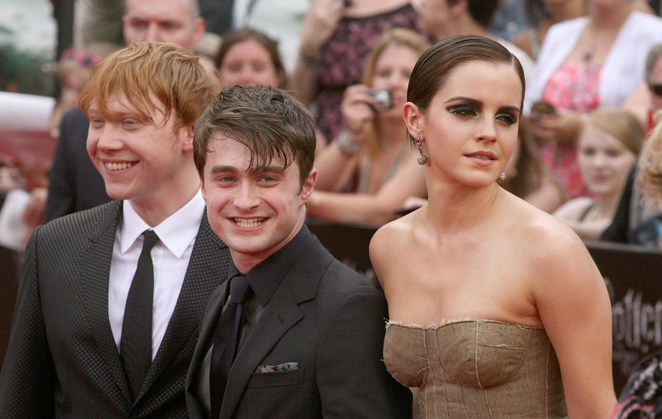 Actors Rupert Grint, Daniel Radcliffe and  Emma Watson attend the premiere of "Harry Potter and the Deathly Hallows - Part 2" at Avery Fisher Hall, Lincoln Center on July 11, 2011 in New York City.