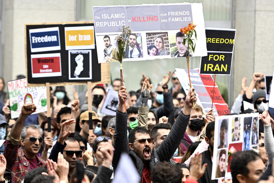 FILE - Members of the Iranian community and their supporters rally in solidarity with protesters in Iran, after 22-year-old Mahsa Amini died in police custody for allegedly improperly wearing a hijab, in Ottawa, Ontario, on Sunday, Sept. 25, 2022. As anti-government protests roil cities and towns in Iran for a fourth week, sparked by the death of Amini, tens of thousands of Iranians living abroad have marched on the streets of Europe, North America and beyond in support of what many believe to be a watershed moment for their home country. (Justin Tang/The Canadian Press via AP, File)