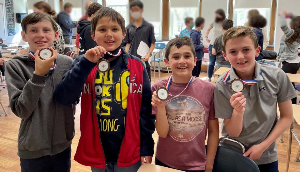 (Left to right) Franklin fifth graders Henry Tuttle, Karl Westerling, Matt Taormina, James Holleran, and Shaan Patel (not pictured) made it to the final rounds of the regional competition of the International Geography Bee while qualifying to compete in nationals in June.