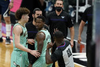 Referee James Williams (60) throws Charlotte Hornets coach James Borrego out of the game during the second half of an NBA basketball game against the Denver Nuggets on Tuesday, May 11, 2021, in Charlotte, N.C. (AP Photo/Chris Carlson)