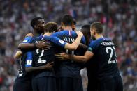 <p>Antoine Griezmann of France celebrates with teammates after scoring a penalty for his team’s second goal. (Photo by Matthias Hangst/Getty Images) </p>