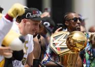 Denver Nuggets center Nikola Jokic celebrates during a rally to mark the Denver Nuggets first NBA basketball championship Thursday, June 15, 2023, in Denver. (AP Photo/Jack Dempsey)