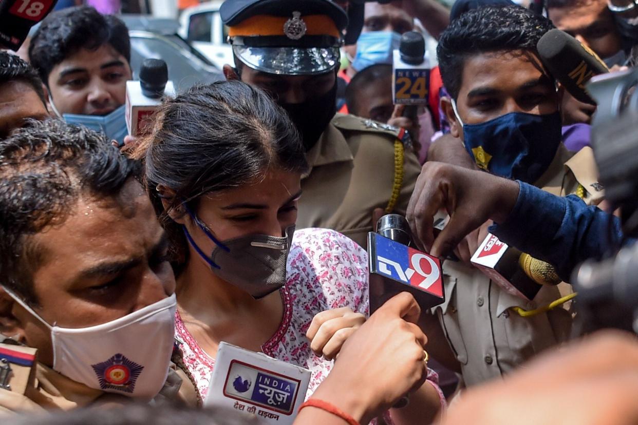 (File) Rhea Chakraborty is seen here arriving at NCB offices in Mumbai for questioning on 6 September (AFP via Getty Images)