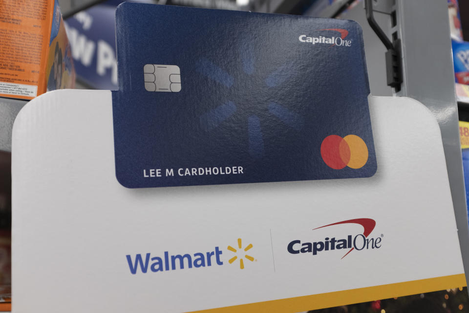 A Capital One Walmart credit card sign is seen at a store in Mountain View, California, United States on Tuesday, November 19, 2019. (Photo by Yichuan Cao/NurPhoto via Getty Images)