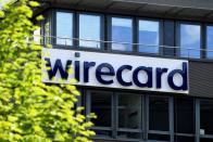 FILE PHOTO: FILE PHOTO: The logo of Wirecard AG is pictured at its headquarters in Aschheim