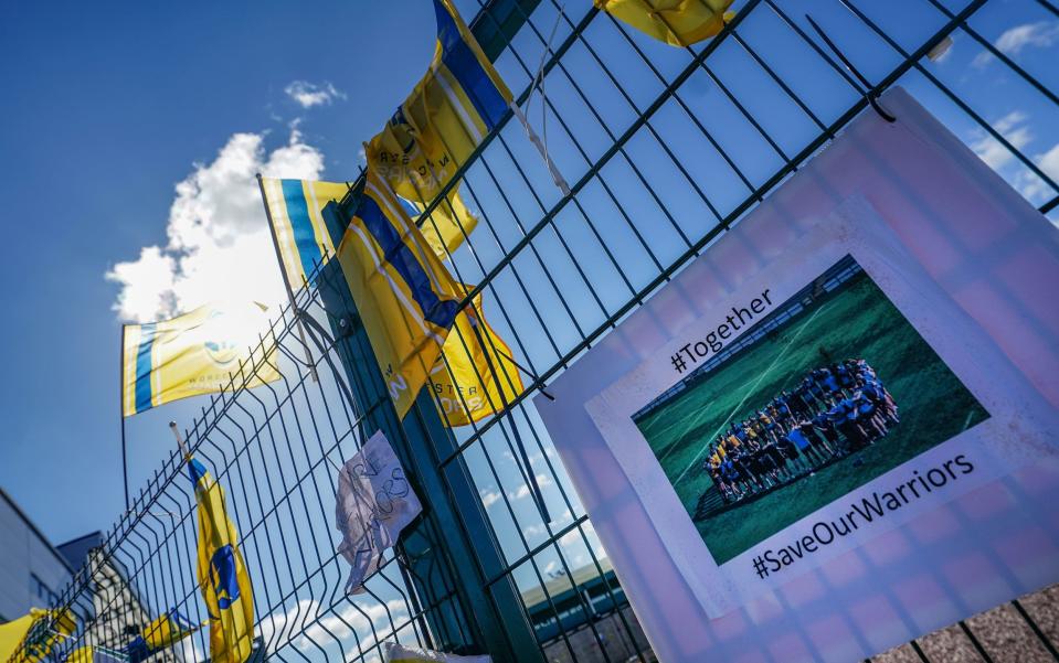 'Save Our Warriors' signs on fences outside Sixways Stadium - PA