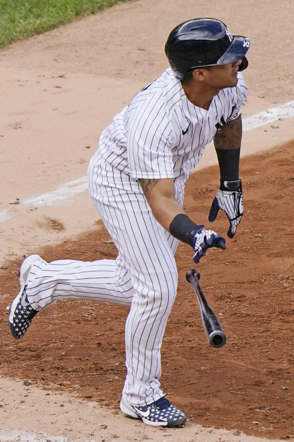 New York Yankees shortstop Gleyber Torres drops the bat as he watches his two-run double in the eighth inning of a baseball game against the Baltimore Orioles, Sunday, Sept. 13, 2020, at Yankee Stadium in New York. (AP Photo/Kathy Willens)