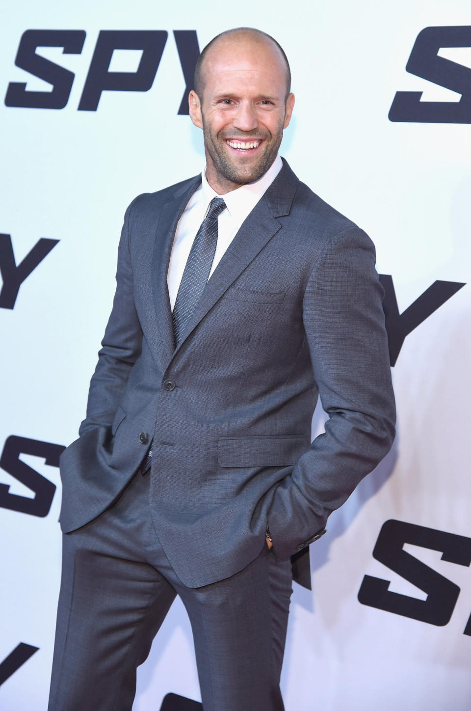 He might be one of the biggest badasses on the silver screen, but on the red carpet Jason Statham’s a sexy softy. Wearing a gray suit and big smile, the actor looked so smooth.