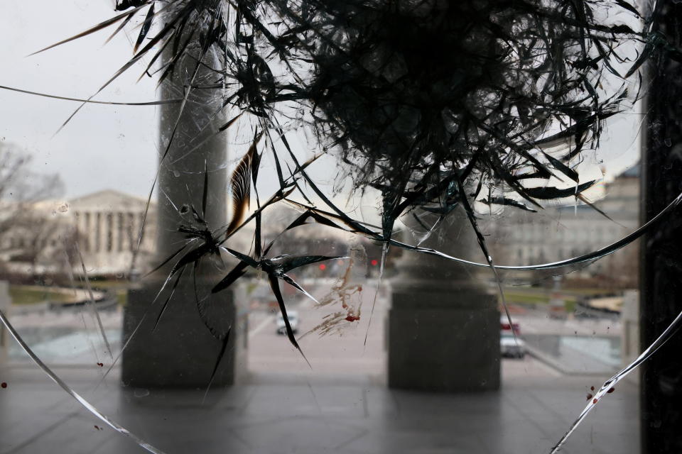 Riot damage is visible on the Rotunda doors of the U.S. Capitol in Washington, U.S. January 8, 2021. REUTERS/Jonathan Ernst