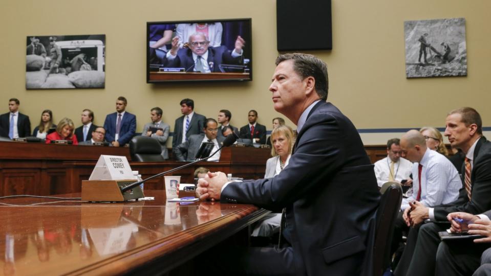 House Oversight Committee member Gerry Connolly, D-Va., can be seen on a TV screen, center, as he addresses FBI Director James Comey. (Photo: J. Scott Applewhite/AP)