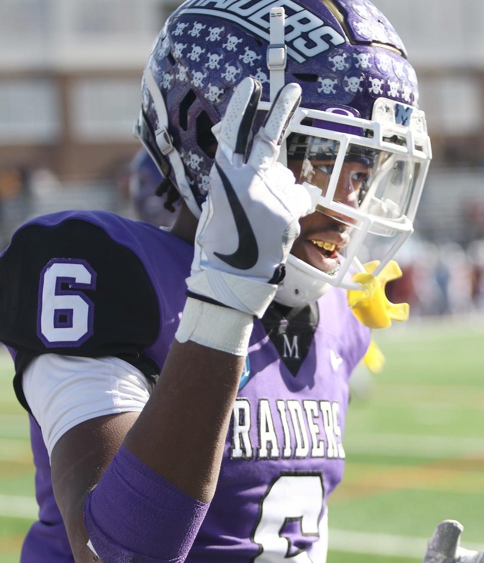 Mount Union's Wayne Ruby Jr. signals "two" for his second touchdown catch of the day against Salisbury during an NCAA playoff game at Kehres Stadium Saturday, November 19, 2022.