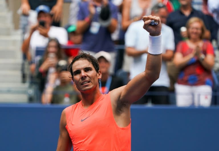 Victory salute: Rafael Nadal celebrates his defeat of Nikoloz Basilashvili