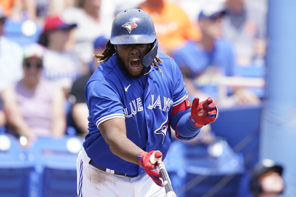 Toronto Blue Jays' Vladimir Guerrero Jr. reacts after flying out during the first inning of a spring training baseball game against the Detroit Tigers, Thursday, March 31, 2022, in Dunedin, Fla. (AP Photo/Lynne Sladky)