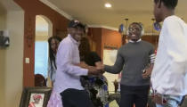 In this still image from video provided by the NFL, Jeff Okudah, second from right, celebrates during the NFL football draft Thursday, April 23, 2020. (NFL via AP)