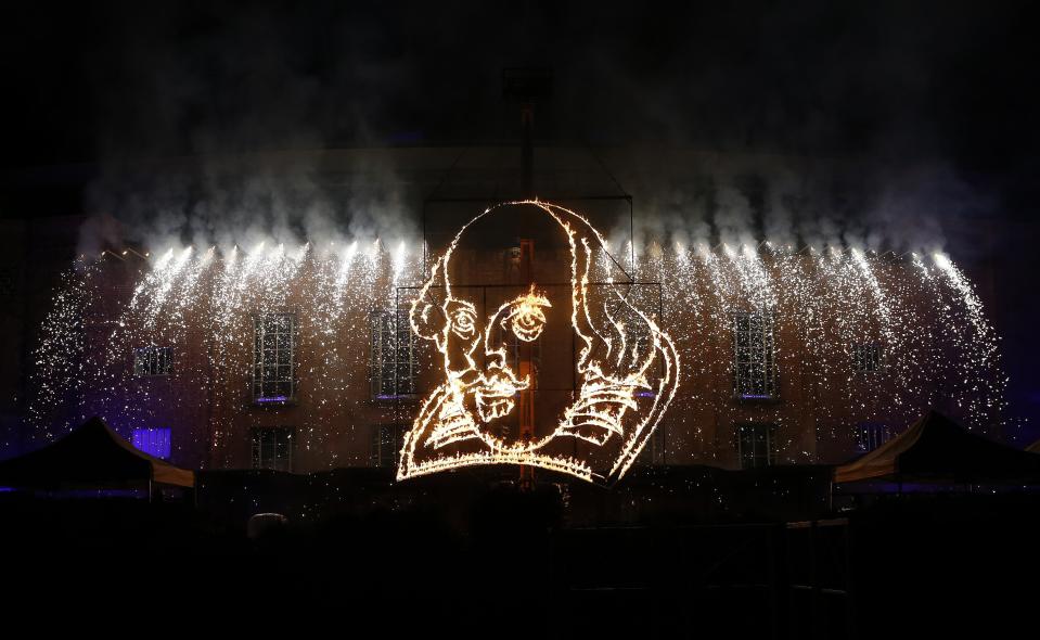 A flaming depiction of William Shakespeare is seen during a firework display at the Royal Shakespeare Company marking the 450th anniversary of Shakespeare's birth in Stratford-upon-Avon, southern England April 23, 2014. Known as the Bard and regarded as England's greatest playwright, Shakespeare, whose 450th birthday is celebrated on Wednesday, let his imagination roam as widely as his characters. REUTERS/Suzanne Plunkett (BRITAIN - Tags: SOCIETY TPX IMAGES OF THE DAY)