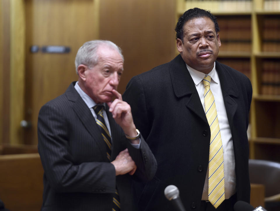 Former New Haven Police Officer Ronald Pressley, right, appears in Superior Court in New Haven, Conn., on Thursday, March 28, 2024, with attorney Jake Donovan seeking accelerated rehabilitation for two charges related to the incident that left Richard "Randy" Cox paralyzed. Four former Connecticut police officers, including Pressley, arrested for allegedly mistreating Cox who wound up paralyzed in the back of a police van in 2022 were denied bids Thursday to enter a program that could have erased criminal charges against them and possibly let them avoid trial. (Arnold Gold/Hearst Connecticut Media via AP, Pool)