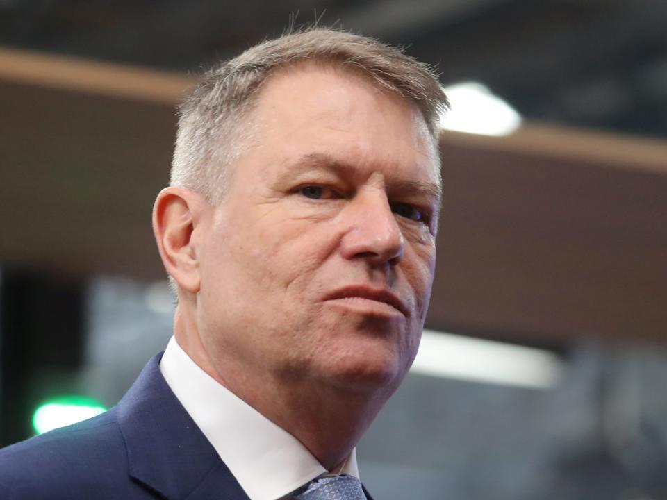 FILE PHOTO: Romania's President Klaus Werner Iohannis arrives for the second day of a special European Council summit in Brussels, Belgium February 21, 2020. Ludovic Marin/Pool via REUTERS/File Photo