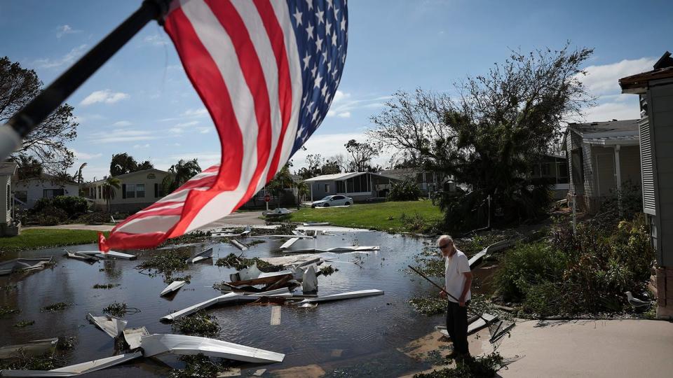 Tom Park begins cleaning up after Hurricane Ian moved through the Gulf Coast of Florida on September 29, 2022 in Punta Gorda, Florida. The hurricane brought high winds, storm surge and rain to the area causing severe damage.