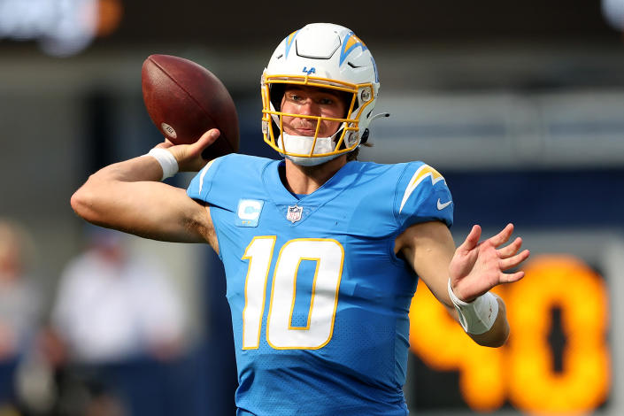 Justin Herbert leads the Chargers against the Jaguars on NFL wild-card weekend. (Photo by Sean M. Haffey/Getty Images)