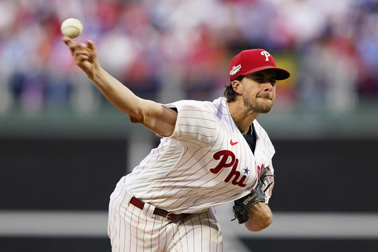 Philadelphia Phillies starting pitcher Aaron Nola (27) throws during the fourth inning in Game 3 of baseball's National League Division Series against the Atlanta Braves, Friday, Oct. 14, 2022, in Philadelphia. (AP Photo/Matt Slocum)