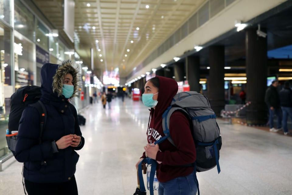 Seen here, two tourists in Italy stranded by a lockdown over the coronavirus crisis.