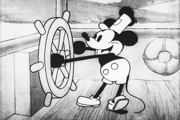 Mickey Mouse at a boat's helm in the 1928 short film 