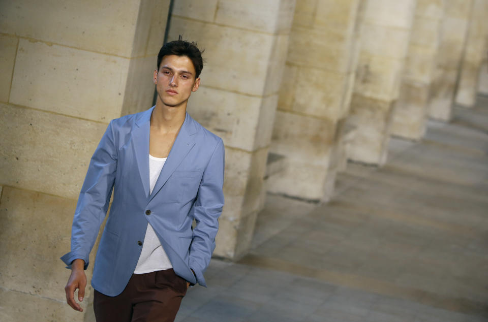 A model wears a creation by French fashion designer Veronique Nichanian as part of Hermes men's fashion Spring-Summer 2014 collection, presented Saturday, June 29, 2013 in Paris. (AP Photo/Francois Mori)