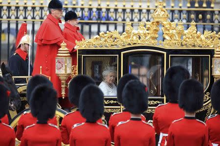 Britain's Queen Elizabeth is driven by carriage from Buckingham Palace to the Houses of Parliament for the State Opening of Parliament in central London, Britain May 18, 2016. REUTERS/Paul Hackett