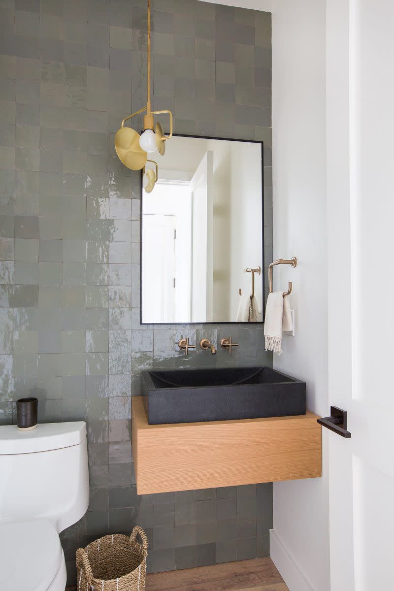 <p>A floating sink means more room for storage underneath-or more free visual space if you want your room to appear larger.</p><p>See more at <a rel="nofollow noopener" href="http://amberinteriordesign.com/projects/client-holla-at-la-jolla/" target="_blank" data-ylk="slk:Amber Interiors;elm:context_link;itc:0;sec:content-canvas" class="link ">Amber Interiors</a>.</p>