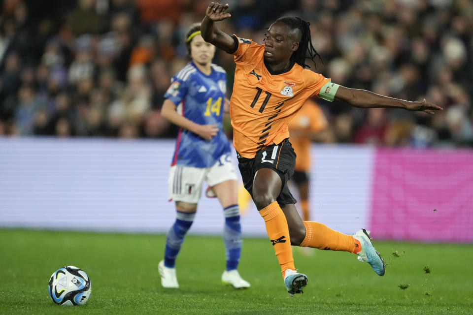 FILE -Zambia's Barbra Banda chases the ball during the Women's World Cup Group C soccer match between Zambia and Japan in Hamilton, New Zealand, Saturday, July 22, 2023. Forward Barbra Banda has officially joined the Orlando Pride after helping the Zambian women's national team secure a spot at this summer's Olympics. (AP Photo/John Cowpland, File)