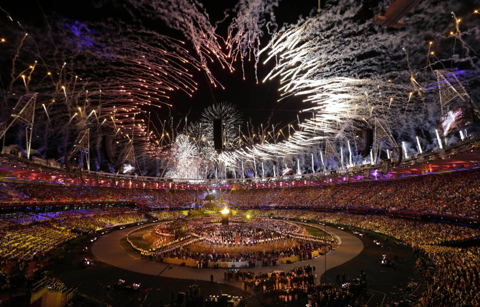 The Olympic cauldron is lit during the Opening Ceremony at the 2012 Summer Olympics, Saturday, July 28, 2012, in London. (AP Photo/Paul Sancya)