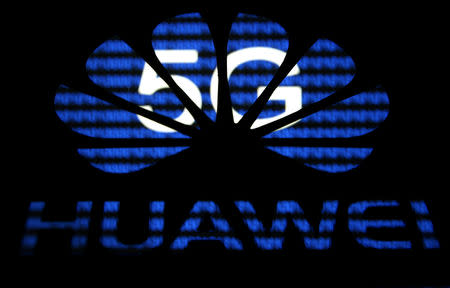 FILE PHOTO: A 3-D printed Huawei logo is seen in front of displayed 5G words in this illustration taken February 12, 2019. To match Special Report HUAWEI-USA/CAMPAIGN REUTERS/Dado Ruvic/File Photo