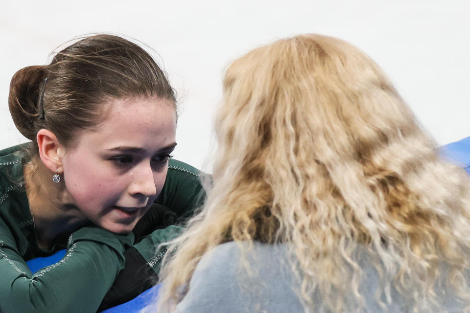 Figure skating coach Eteri Tutberidze (R) instructs Russian athlete Kamila Valieva during a training session at the Capital Indoor Stadium on Feb. 14, 2022 in Beijing. (Valery Sharifulin\TASS via Getty Images)