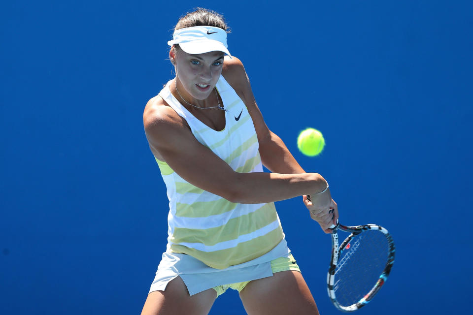 Ana Konjuh of Croatia plays a backhand in her first round match against Ellen Perez of Australia during the 2013 Australian Open Junior Championships at Melbourne Park on January 19, 2013 in Melbourne, Australia. 