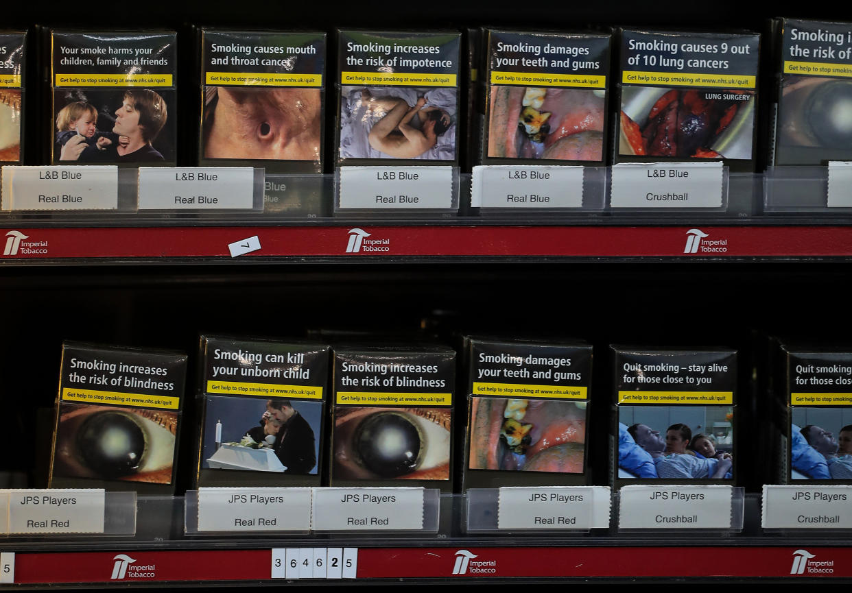 Cigarettes and tobacco for sale in a corner shop in Liverpool in standardised packaging bearing graphic warnings of the dangers of smoking, as rules designed to prevent young people taking up the habit come into full effect this weekend. (Photo by Peter Byrne/PA Images via Getty Images)