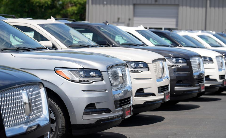 Unsold 2023 Aviator sports-utility vehicles sit in a long row at a Lincoln dealership on June 18, 2023, in Englewood, Colo.