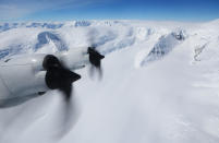 <p>Ice is viewed from NASA’s Operation IceBridge research aircraft, in the Antarctic Peninsula region on Oct. 31, 2017, above Antarctica. (Photo: Mario Tama/Getty Images) </p>