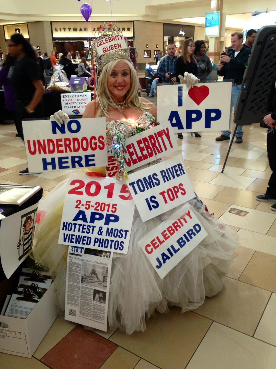 Sondra Fortunato, aka Miss Liberty, stands outside the “jail” inside Ocean County Mall.