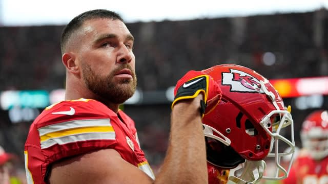 Kansas City Chiefs tight end Travis Kelce warms up before the start of an NFL football game against the Miami Dolphins.