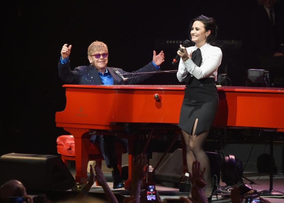 Elton John with Demi Lovato (Getty Images )