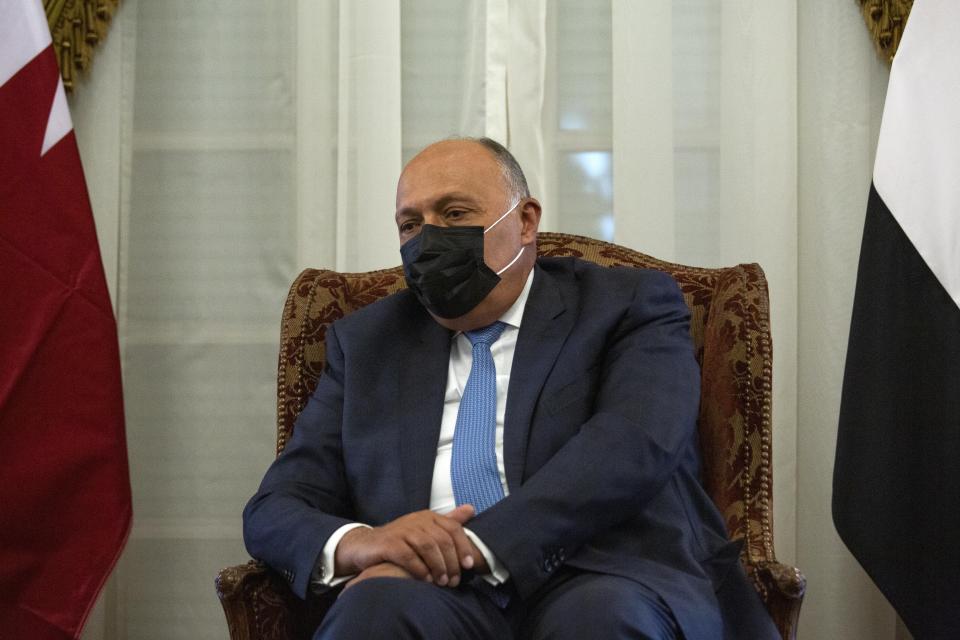 Egyptian Foreign Minister Sameh Shoukry meets with Qatar's Deputy Prime Minister and Foreign Minister Sheikh Mohammed bin Abdulrahman bin Jassim Al-Thani, at the Tahrir Palace in Cairo, Egypt, Tuesday, May 25, 2021. (AP Photo/Nariman El-Mofty)